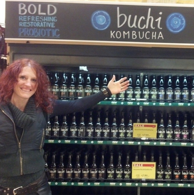 Sarah in front of an original Whole Foods Buchi display!